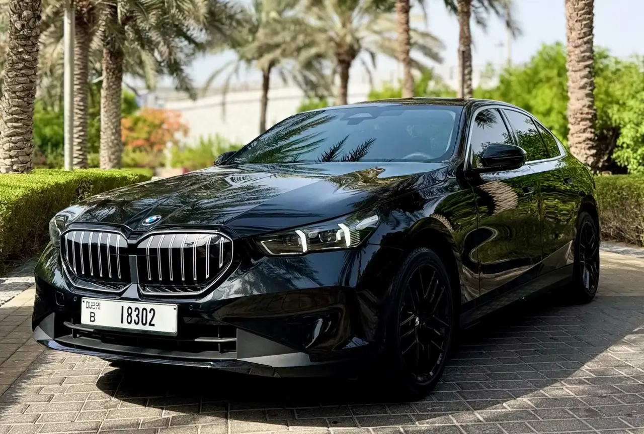 Black BMW 520i 2026 front view available for rental in Dubai
