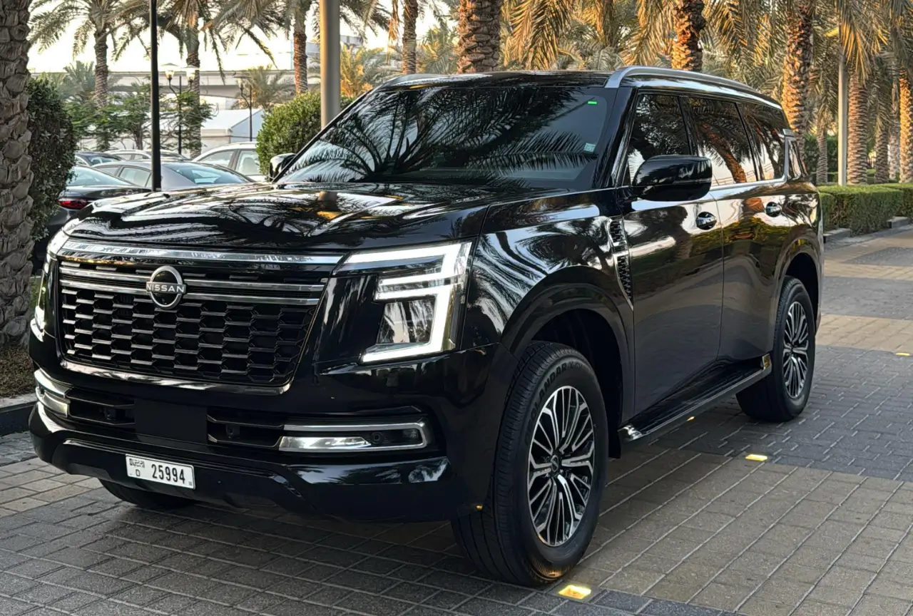 Black Nissan Patrol Platinum rear exterior available for rental in Dubai